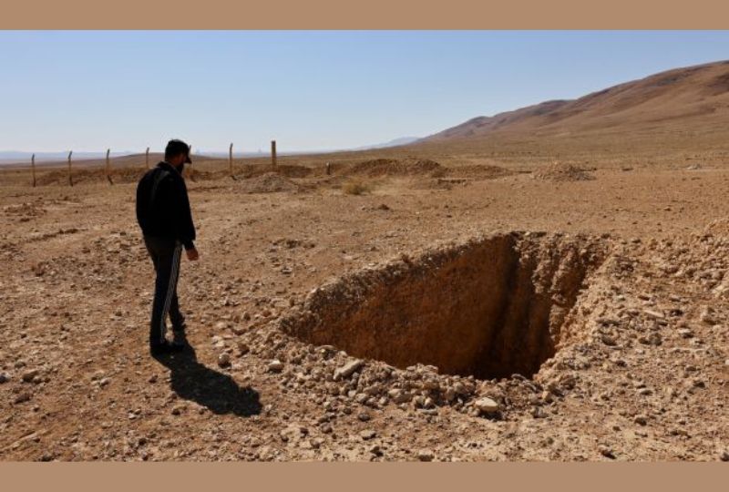 Syria to probe Assad-era mass grave in Dhumair desert